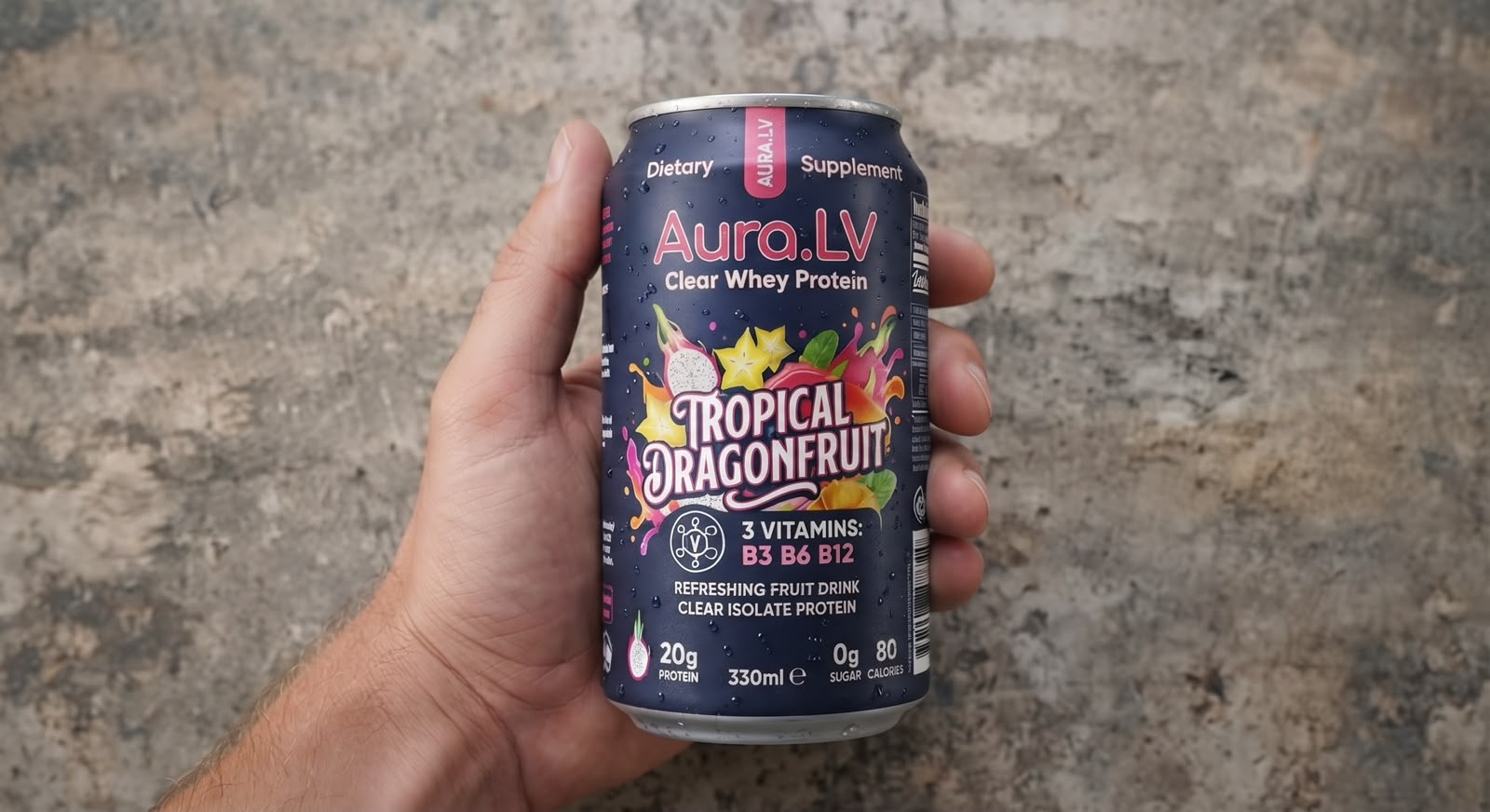 Hand holding an AURA.LV Clear Whey Protein can